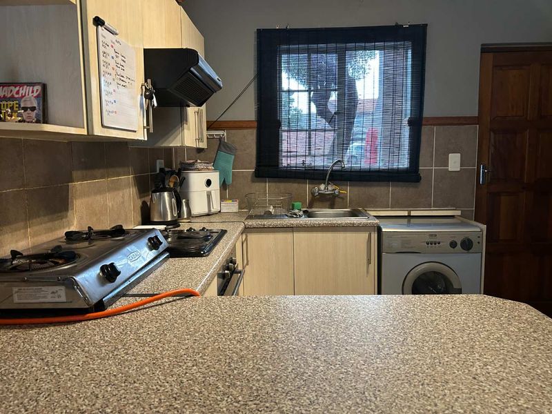 Ground floor with covered patio. - Photo 9