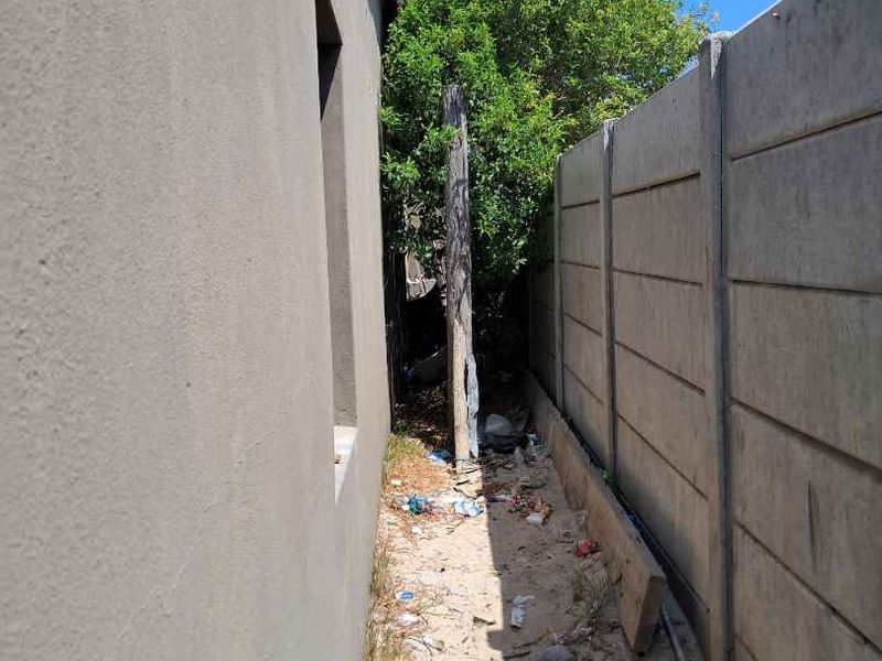 Charming 3-Bedroom Home with Spacious Open-Plan Living - Photo 7