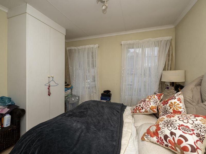 SECURE LIVING WITH POTENTIAL: 2-BEDROOM HOME WITH CHARM - Photo 9