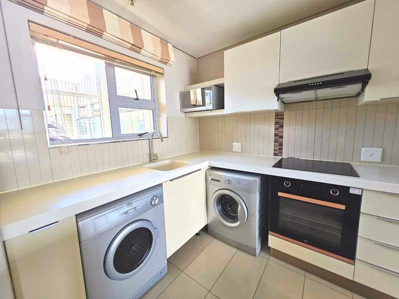 Modern 2-Bedroom Apartment with Stunning Views at Montclare Place - Photo 5