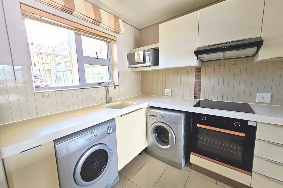 Modern 2-Bedroom Apartment with Stunning Views at Montclare Place - Photo 5