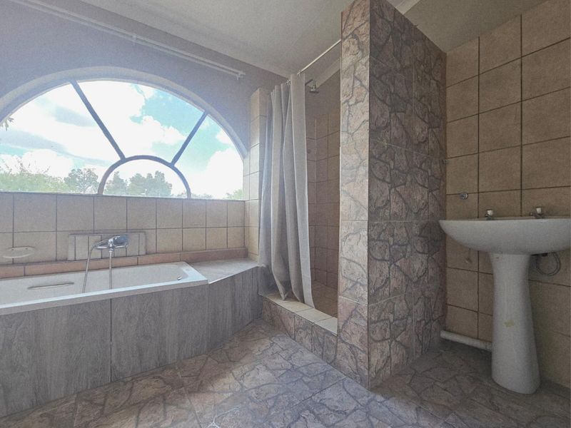 Spacious 5-Bedroom Family Home Within Walking Distance of Schools - Photo 9