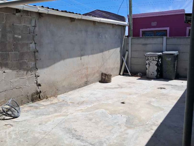 Charming One-Bedroom Home with Additional Outside Room - Photo 8