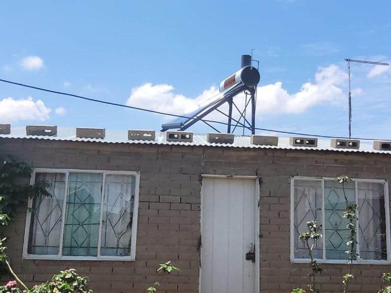 FOUR ROOM HOUSE WITH SUN GEYSER. ANOTHER TWO ROOMS AT BACK ALREADY IN PROGRESS. - Photo 4