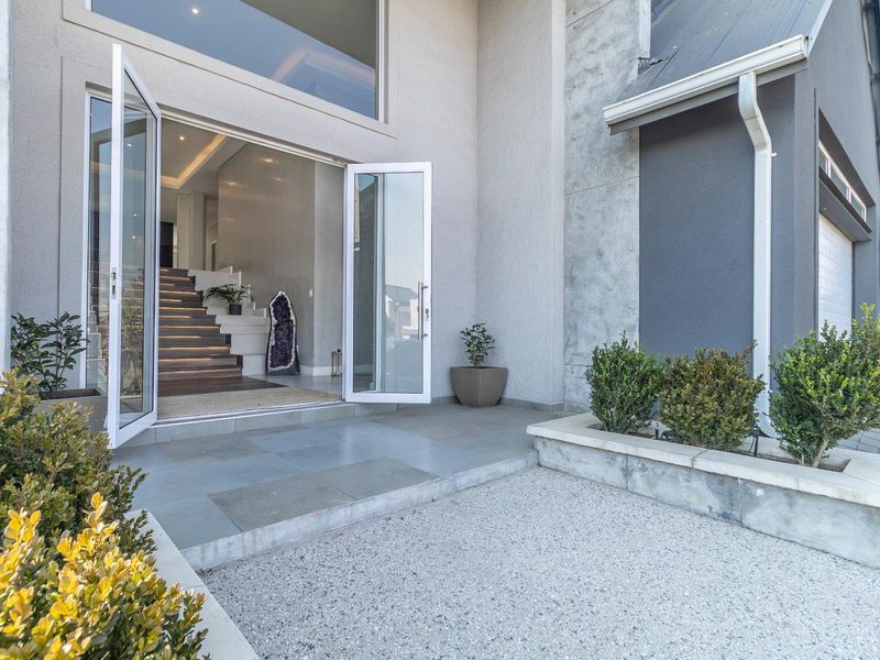 Contemporary Elegance with Exceptional Family Living in Waterfall Country Estate - Photo 4