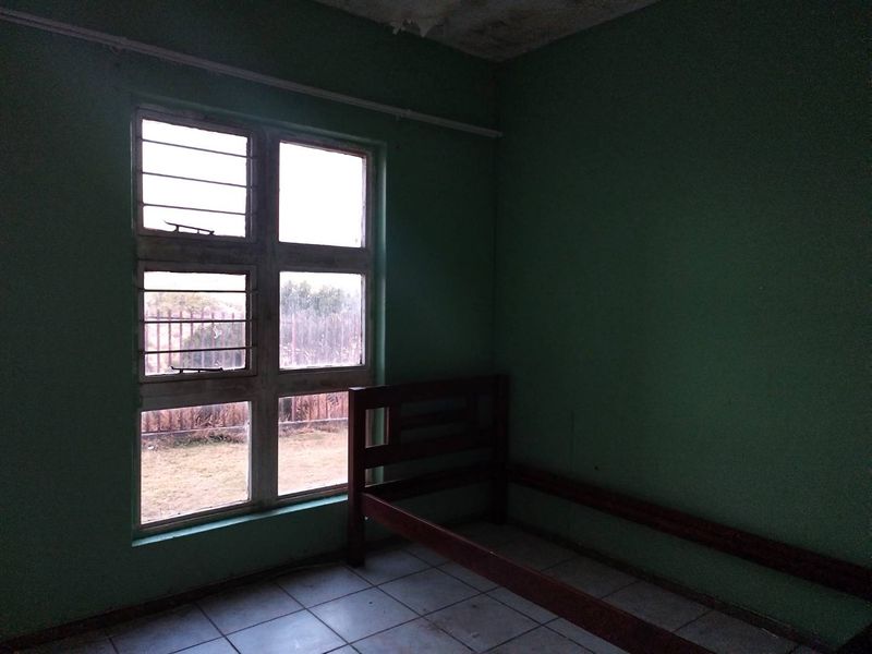 Unlock Potential: Fixer-Upper in Prime Nicolus Estate - Photo 6