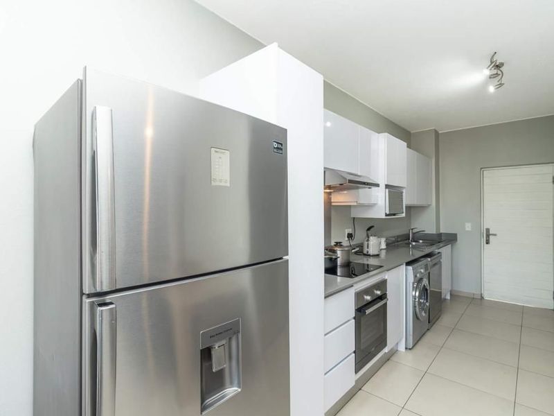 MODERN APARTMENT AWAITS YOU - Photo 2