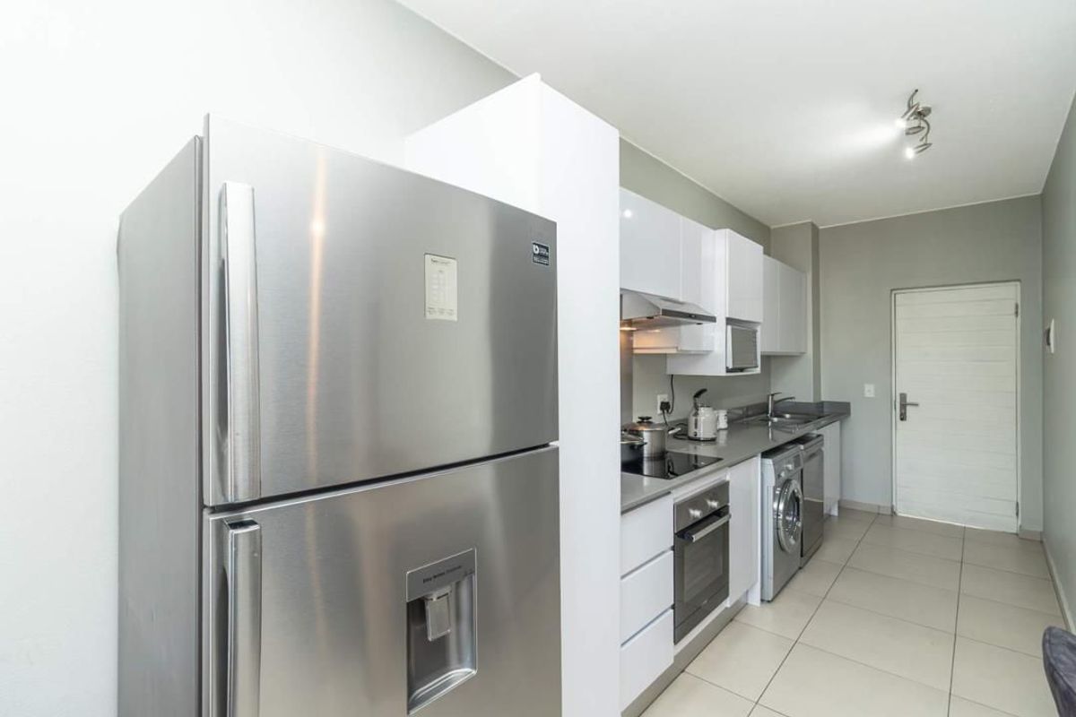 MODERN APARTMENT AWAITS YOU - Photo 2