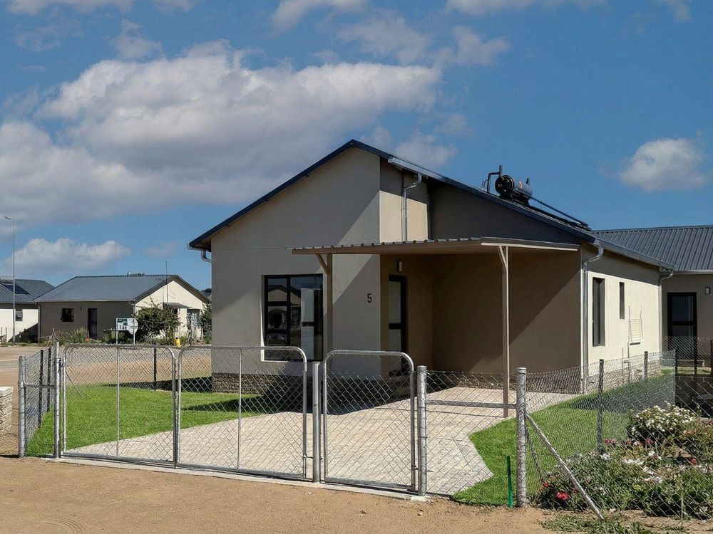 3-Bedroom freestanding townhouse with carport and provision for future expansion.