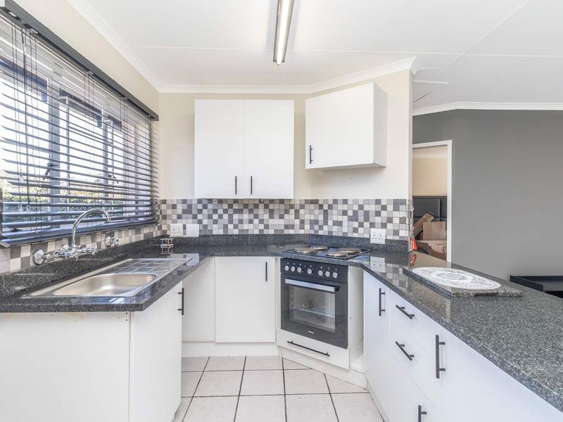 Spacious 1 Bedroom Townhouse with Expansive Private Garden | Sunrock Village Gem - Photo 7