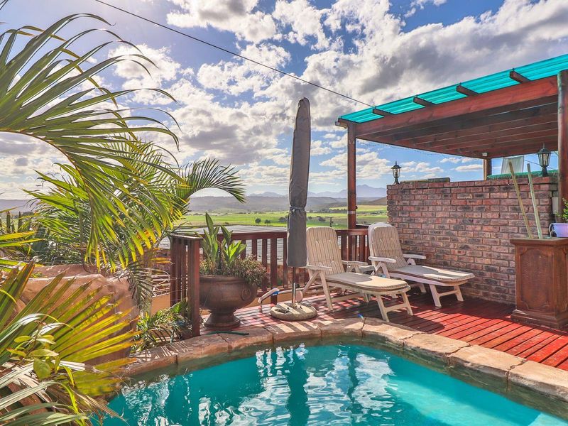 Embrace Farm Views and Income Potential in This Versatile Home! - Photo 2