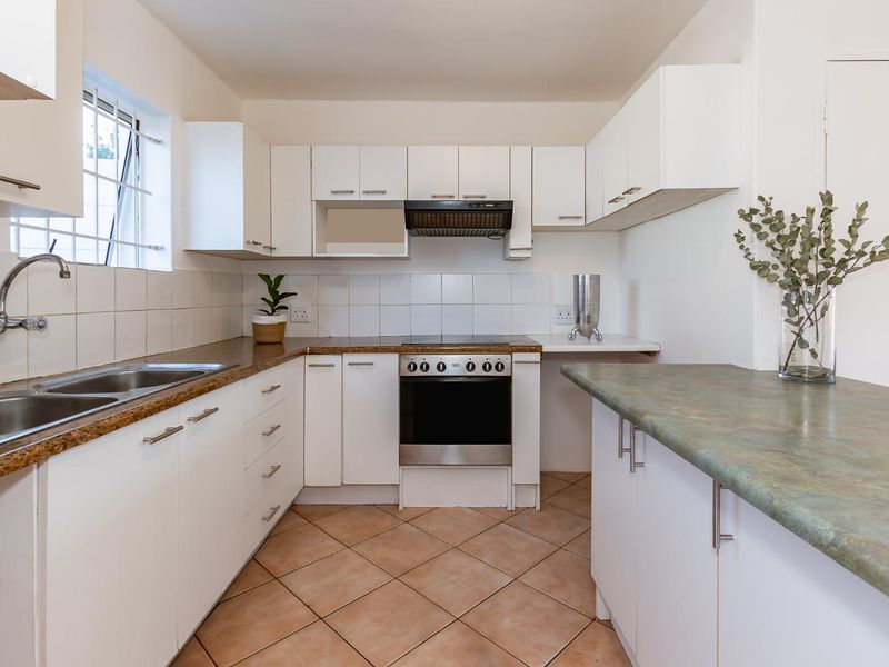 Elegant Double-Storey Living in a Secure, Sought-After Setting - Photo 4