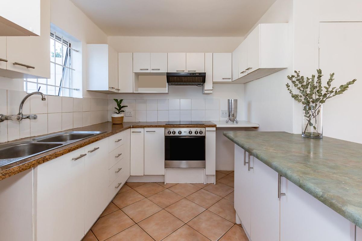 Elegant Double-Storey Living in a Secure, Sought-After Setting - Photo 4