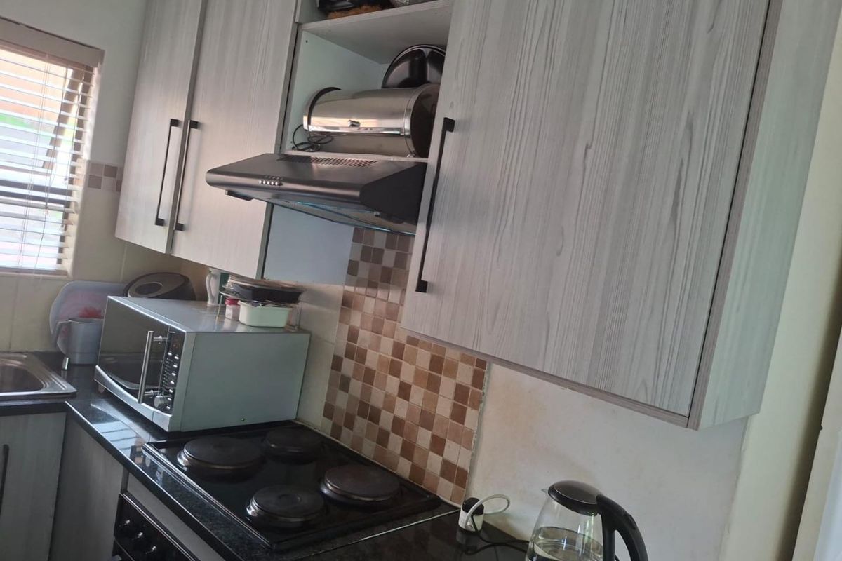 Secure solar powered two bedroom home featuring a built-in braai - Photo 2