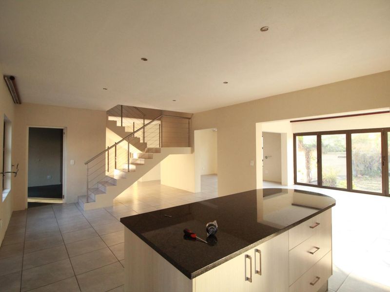 Elegant Family Living in a Quiet Cul-de-Sac | Blue Valley Golf Estate - Photo 8