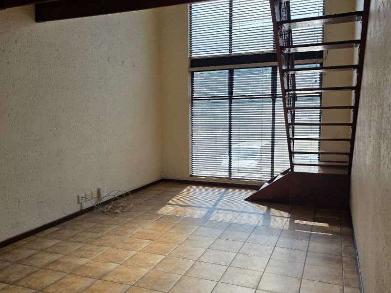 LOCK UP AND GO LOFT APARTMENT - Photo 8