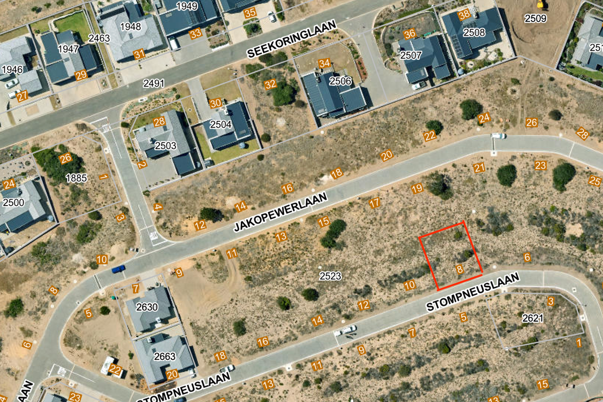An aerial view of a vacant residential plot located on Stompneuslaan, highlighting the property boundaries and surrounding neighborhood infrastructure.