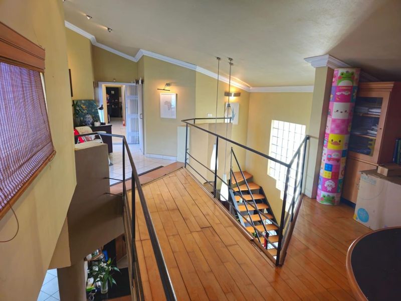 A Rare Double-Storey Home with Breathtaking Golf Course Views. - Photo 8
