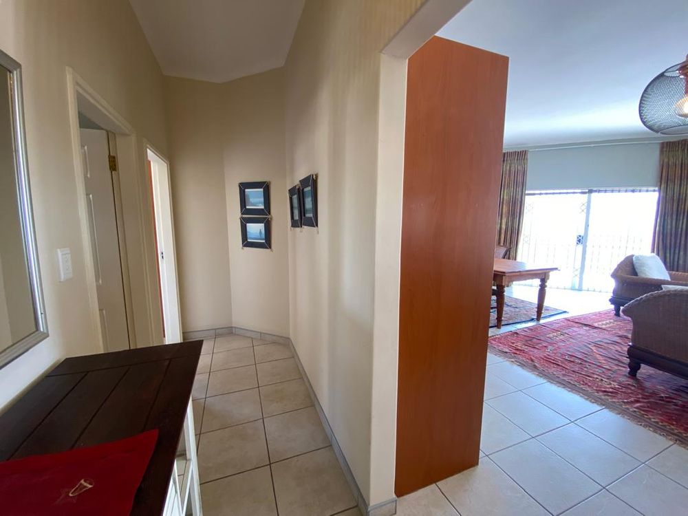 The hallway leading to the two bedrooms
