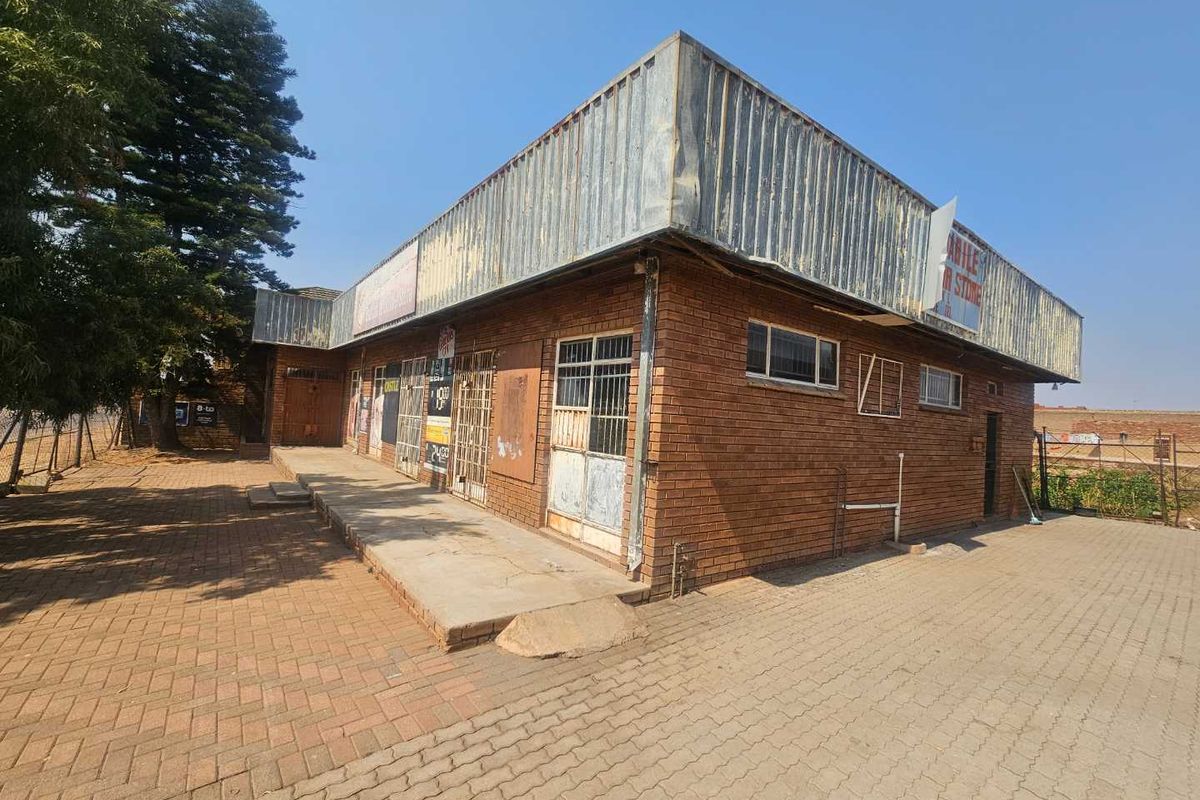 Versatile Commercial Property with Retail and Warehouse Buildings and Cold Storage - Photo 3