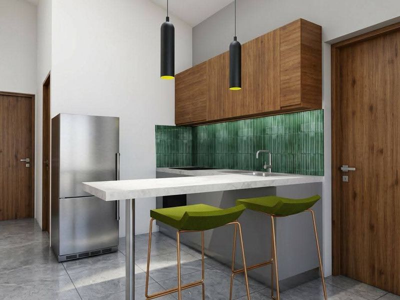 Modern kitchen featuring wood-tone cabinetry, a green tiled backsplash, stone breakfast bar, and sleek pendant lighting in a contemporary townhouse setting.