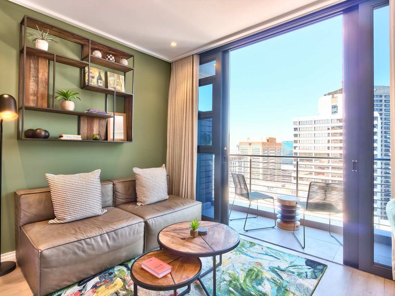 Elevated City Living | 16 On Bree Studio with Balcony | Pool & Views - Photo 1