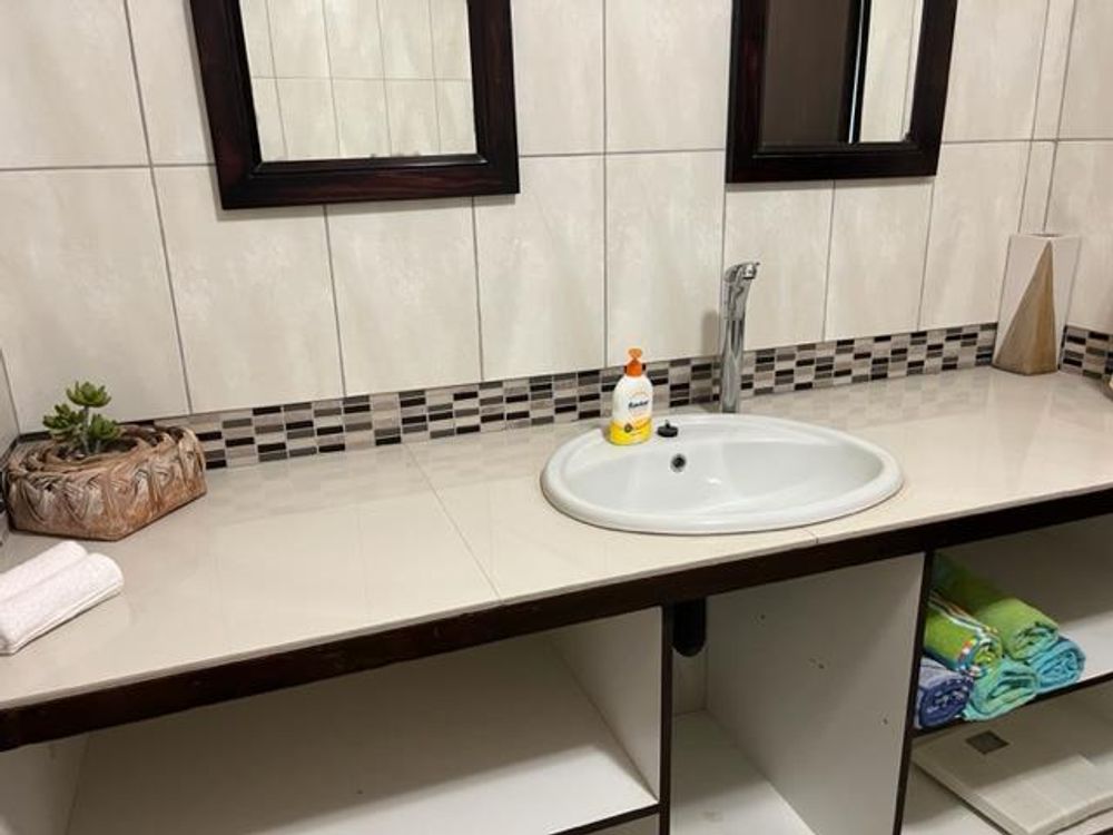 Guest bathroom for guest bedrooms and pool area