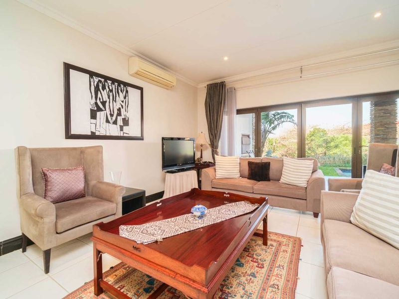 Experience exclusive coastal living in this luxurious, lock-up-and-go apartment within the prestigious Zimbali Coastal Resort. - Photo 7
