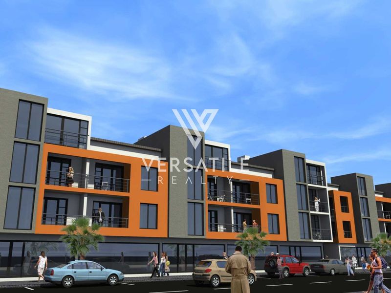 A modern multi-story retail and residential building featuring contemporary architectural design, large glass windows, and private balconies.