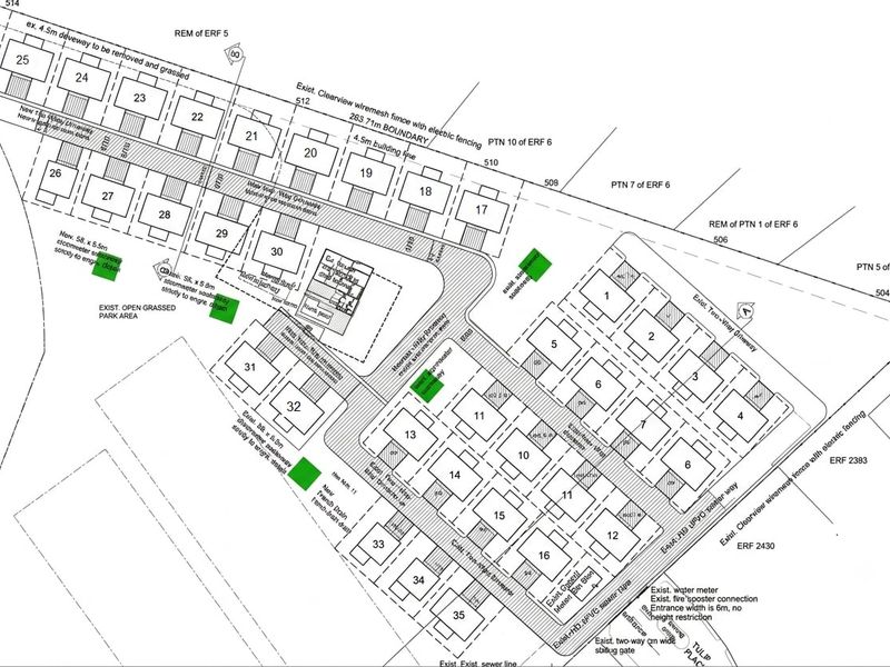 A detailed site development plan showing property boundaries, unit layouts, driveway access, and utility infrastructure connections.