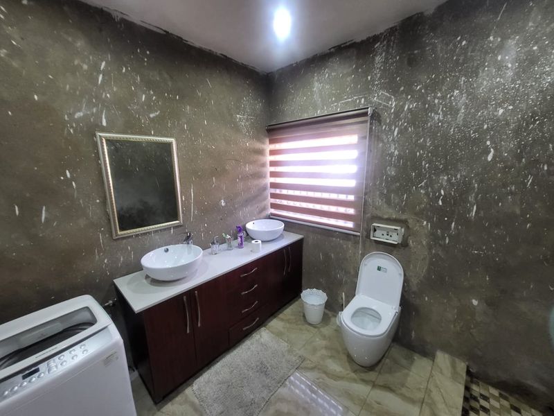 Spacious 3-Bedroom Family Home with 2 Income-Generating Cottages for Sale in Orange Grove - Photo 3