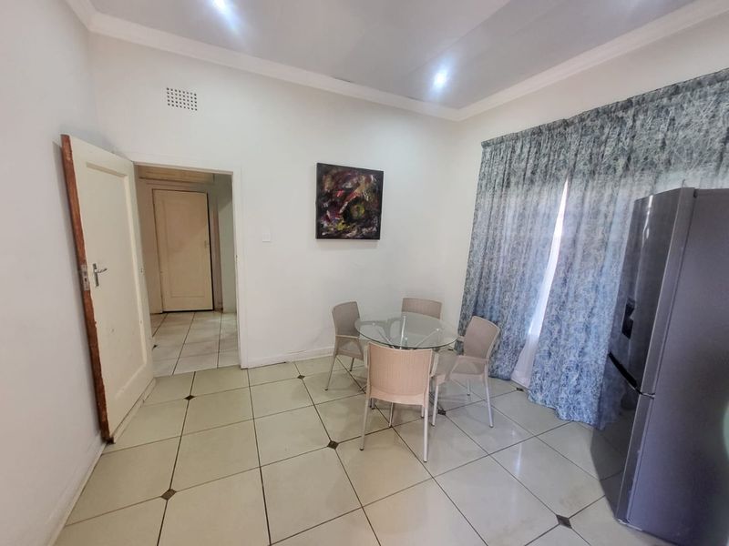 Spacious 3-Bedroom Family Home with 2 Income-Generating Cottages for Sale in Orange Grove - Photo 8