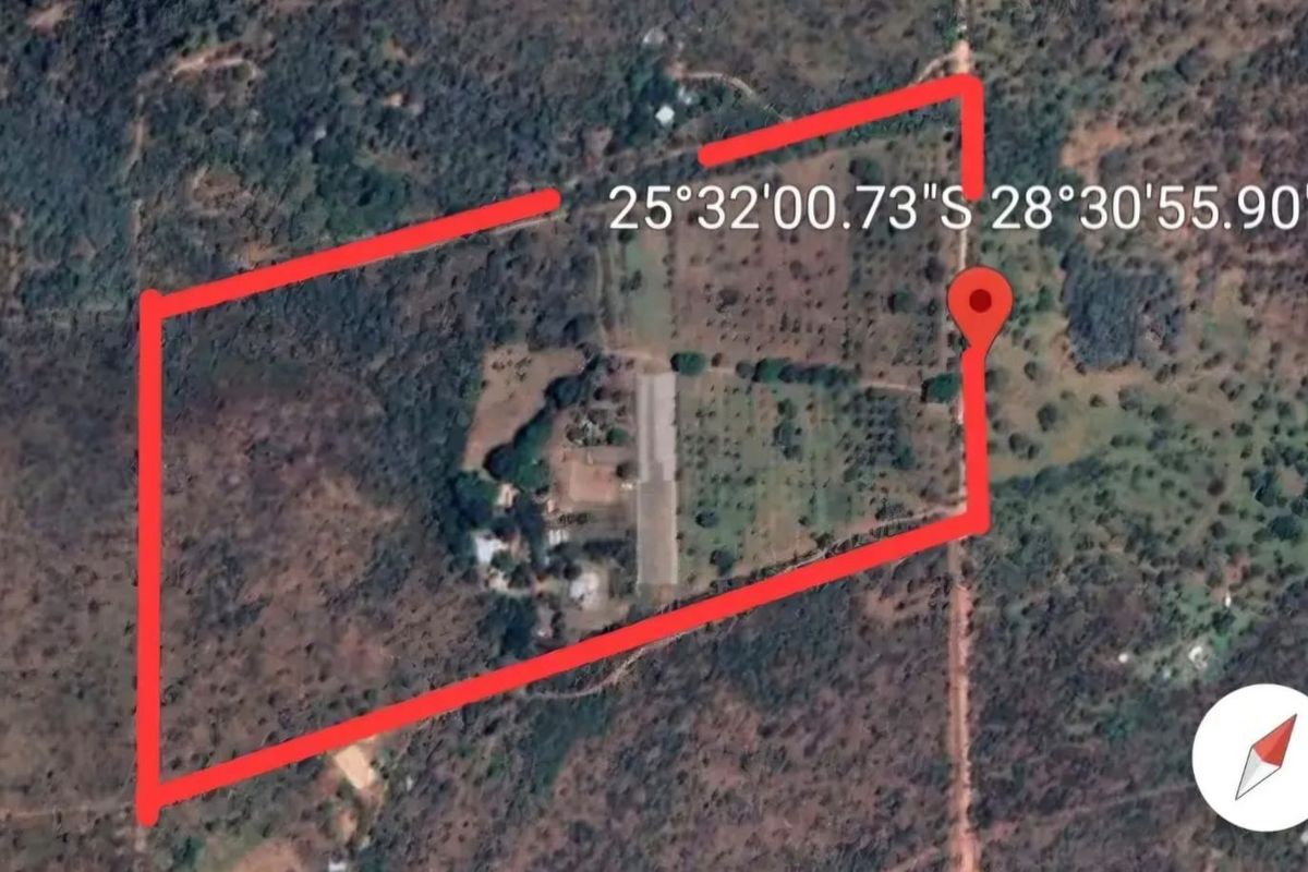 An aerial satellite view showing the property boundary and surrounding landscape of the farm.