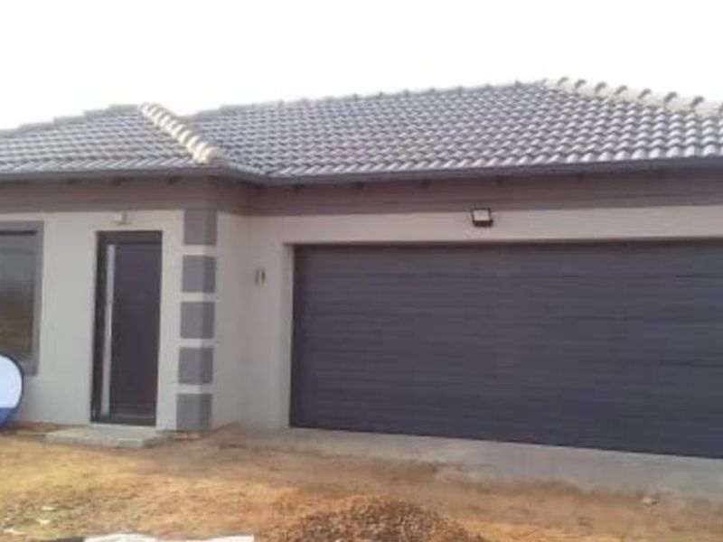 Front elevation of a modern single-story house featuring a tiled roof, dark-toned double garage door, and aluminium window frames.