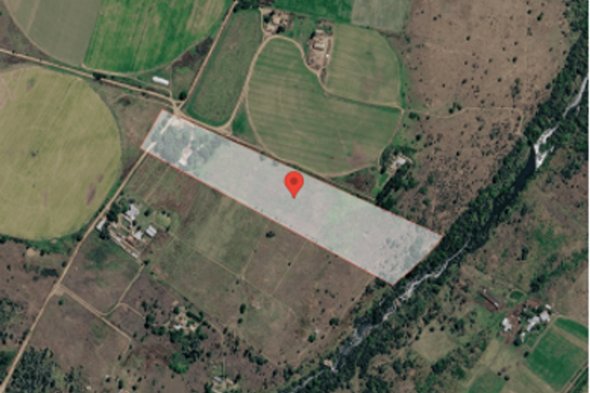 An aerial satellite view showing the demarcated boundaries of the small holding property within the surrounding rural landscape.