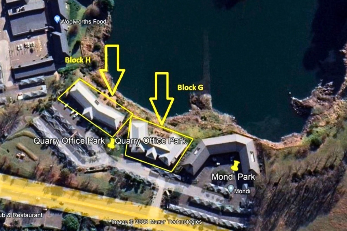 Aerial view of Quarry Office Park showing Block G and Block H situated in a waterfront office complex setting.
