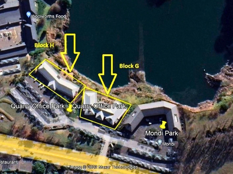 Aerial view of Quarry Office Park showing Block G and Block H situated in a waterfront office complex setting.