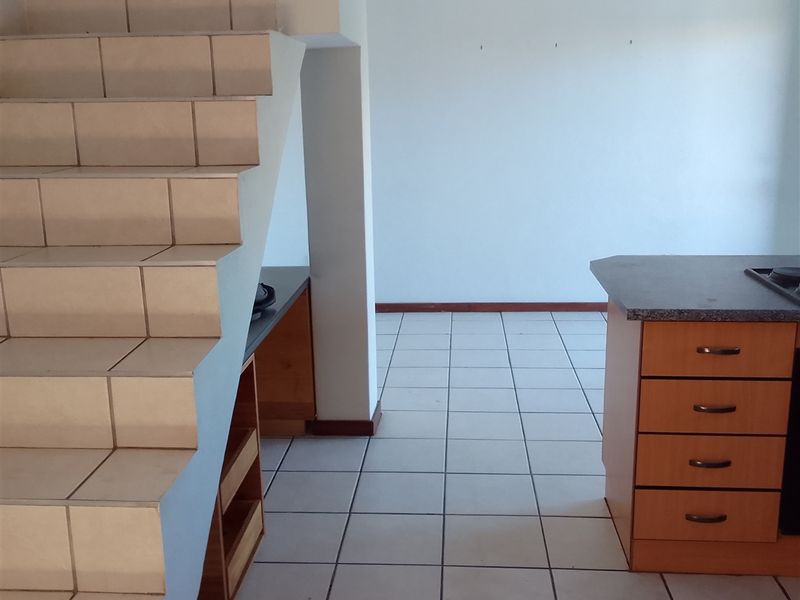 Spotless Duplex Unit with Balcony and Workstation - Photo 6