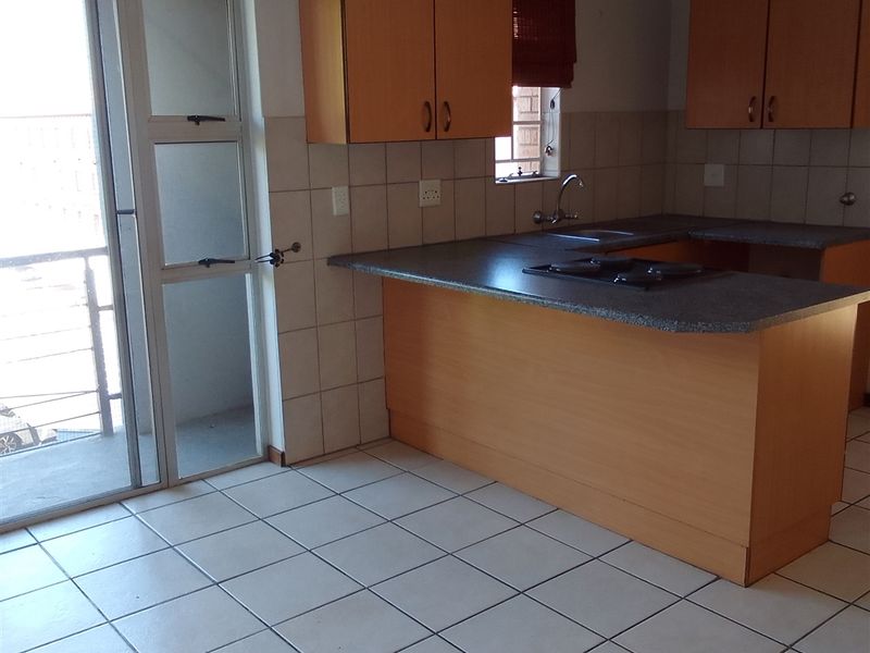 Spotless Duplex Unit with Balcony and Workstation - Photo 2