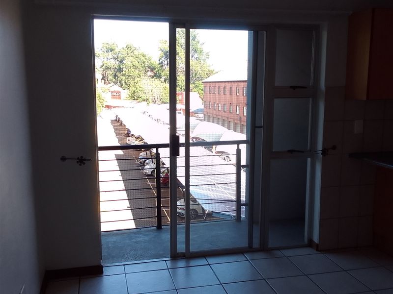 Spotless Duplex Unit with Balcony and Workstation - Photo 10