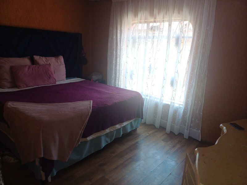 Charming 3-bedroom home with additional outside rooms- ideal for family living or investment - Photo 6