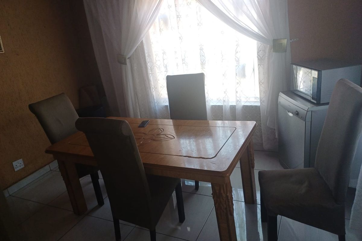 Charming 3-bedroom home with additional outside rooms- ideal for family living or investment - Photo 4