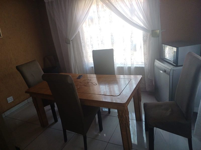Charming 3-bedroom home with additional outside rooms- ideal for family living or investment - Photo 4