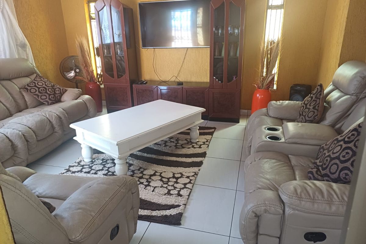 Charming 3-bedroom home with additional outside rooms- ideal for family living or investment - Photo 5