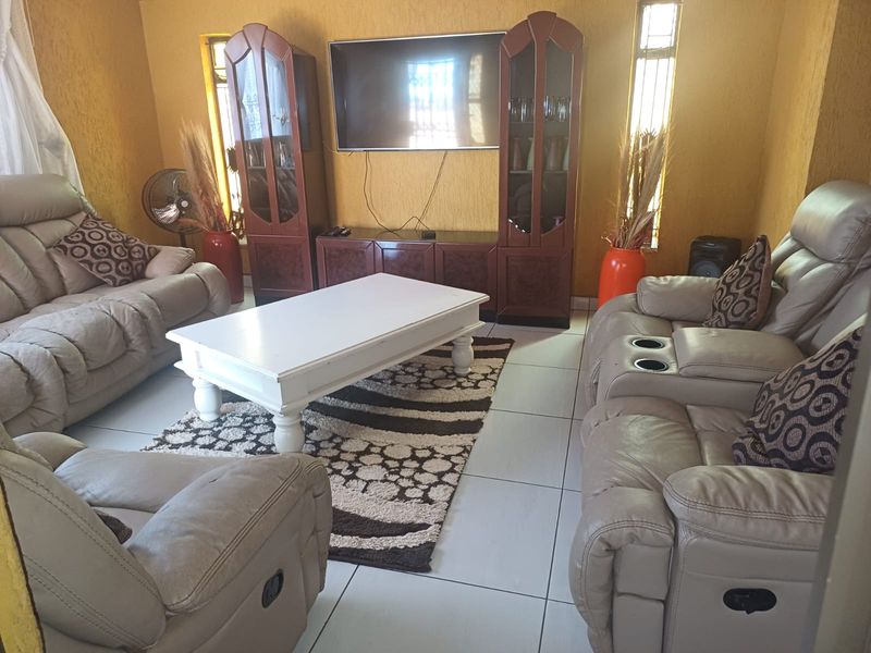 Charming 3-bedroom home with additional outside rooms- ideal for family living or investment - Photo 5