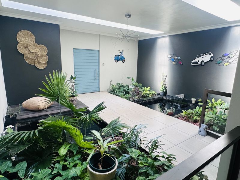 Beautiful 4-Bedroom Home with Indoor Garden with 5KVA Solar invetor - Photo 3