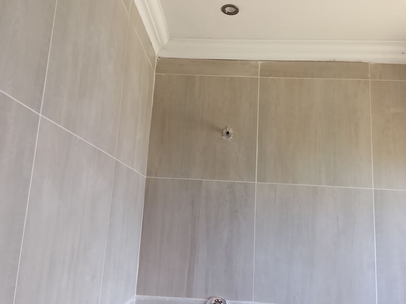Spacious 4-Bedroom Home with Security Features and Solar Power – Renovation Opportunity - Photo 5
