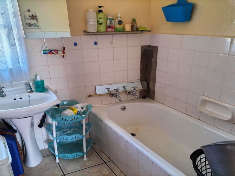 Well-Maintained Three-Bedroom Home with Gas Features and Secure Parking - Photo 9
