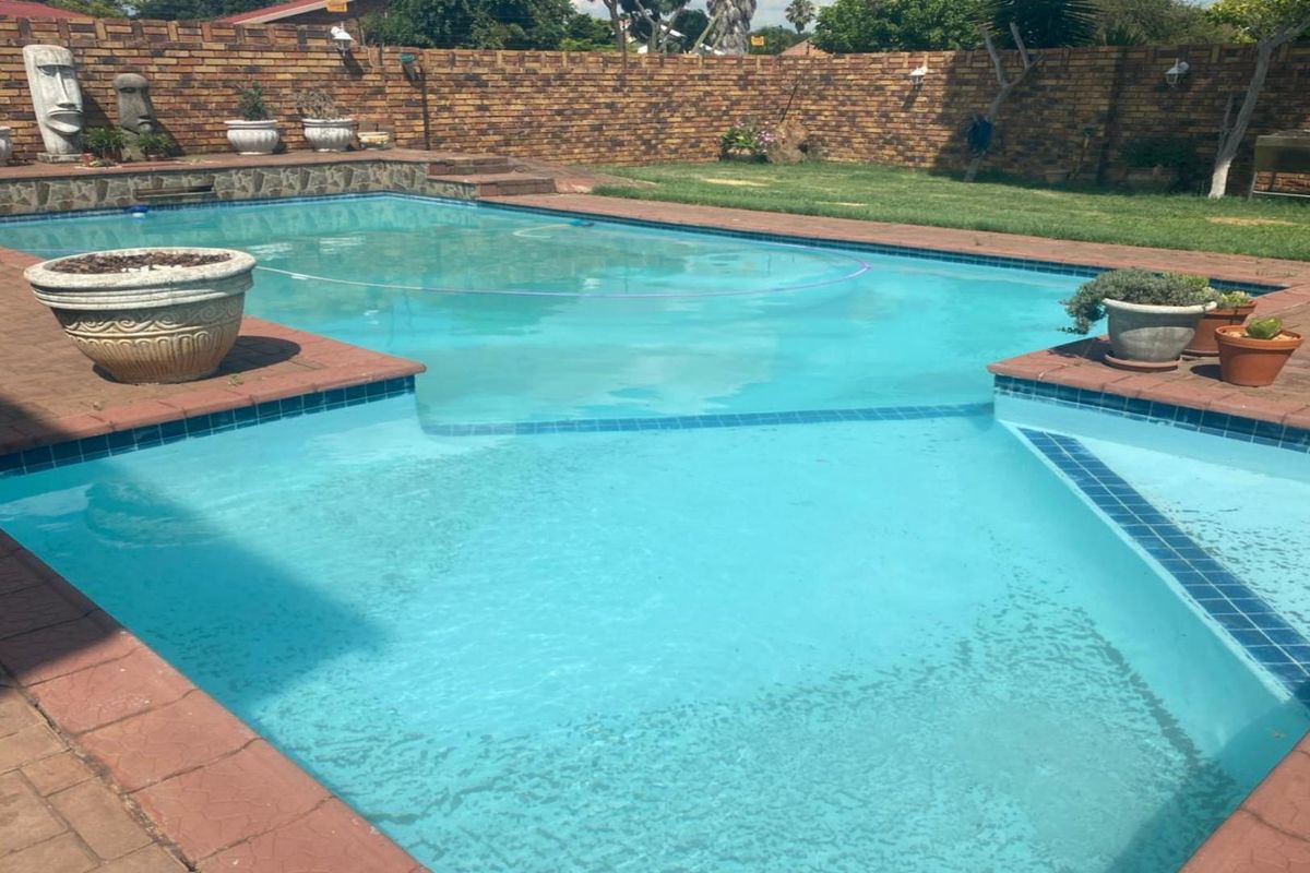 Neat 3-Bedroom Home with Pool & Income-Generating Flatlet - Photo 3