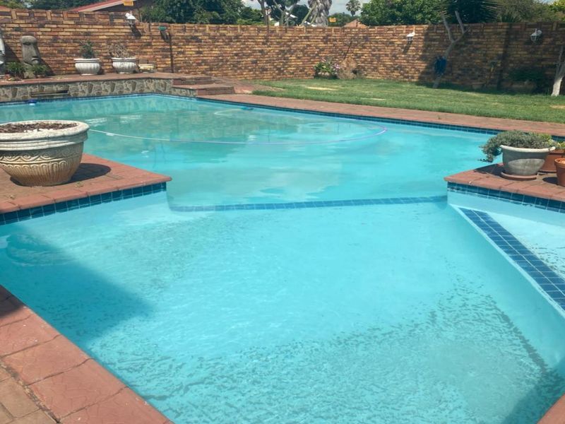 Neat 3-Bedroom Home with Pool & Income-Generating Flatlet - Photo 3